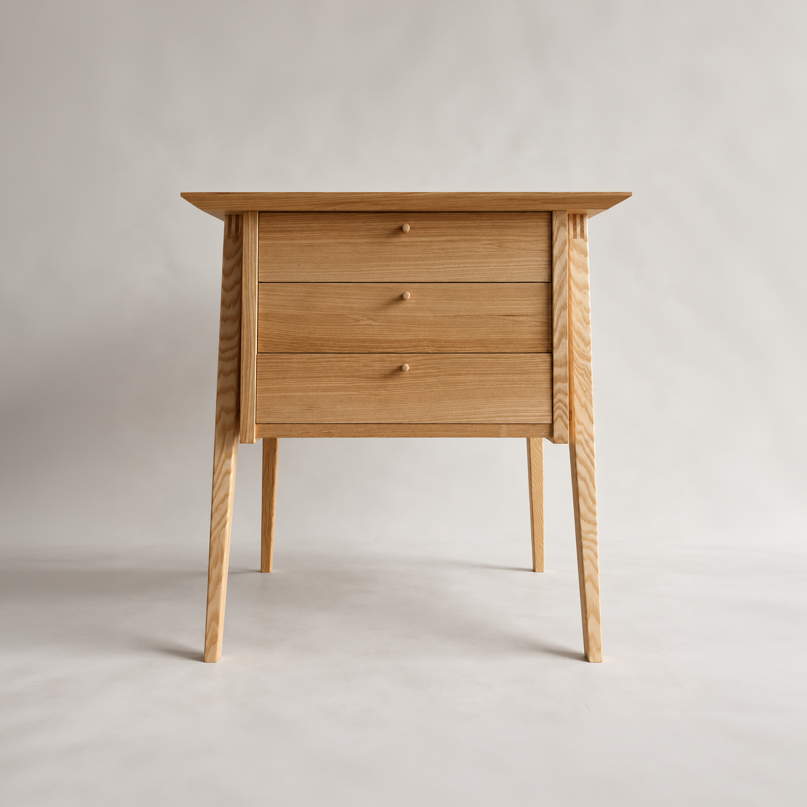 Front view of the Yugen Side Stand with three drawers
