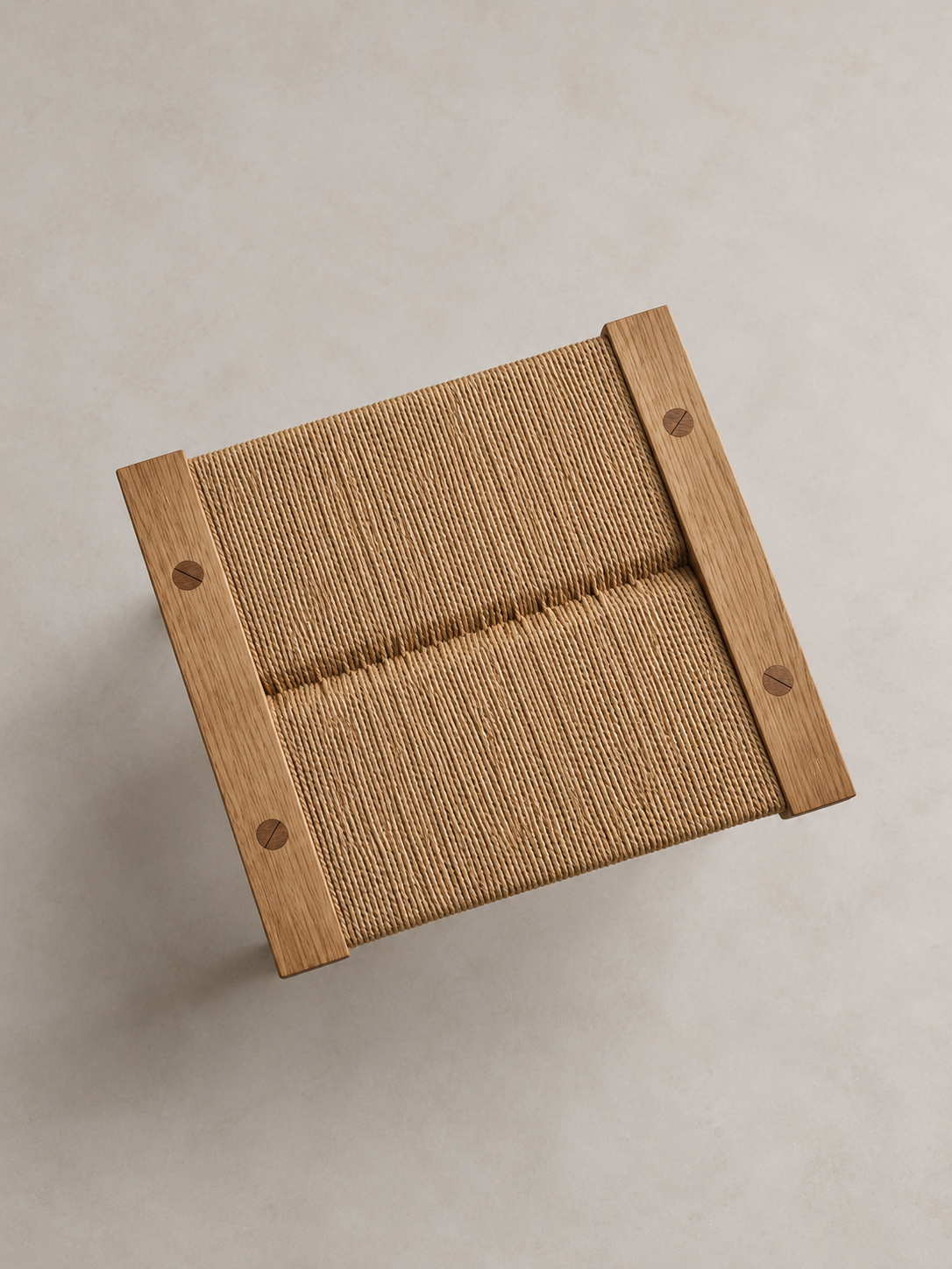 Overhead view of the Shibui Footstool woven seat and timber frame