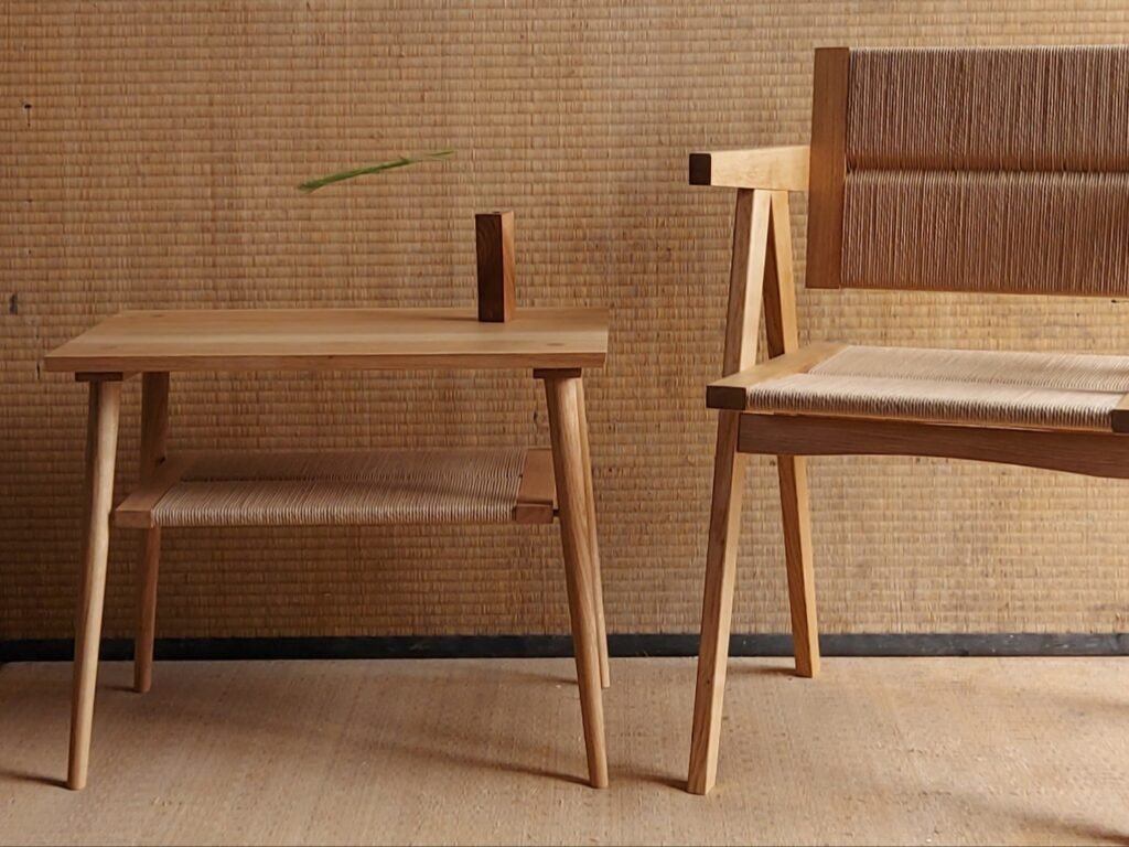 Shibui Side Stand and Yoisho Chair against a woven backdrop