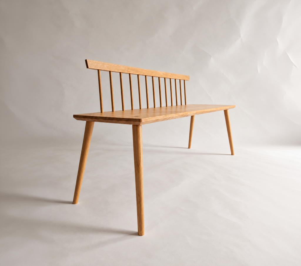 Three-quarter view of the Nokori Bench with timber spindle back