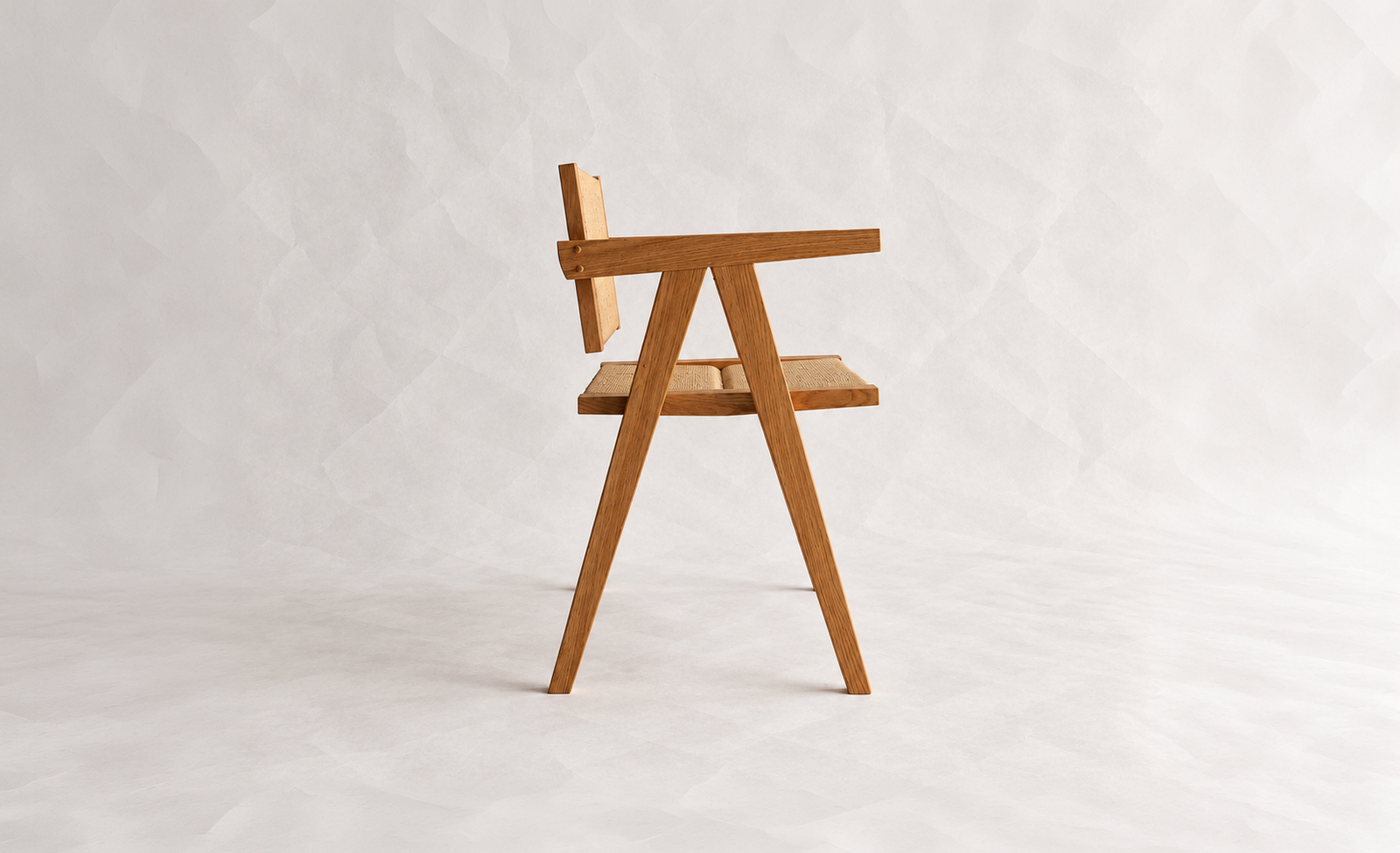 Yoisho Chair side profile with projecting arms and woven seat